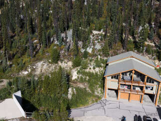 Experience mountain living in this stunning property nestled amidst a dense forest.