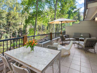 Enjoy breathtaking mountain views from this stunning outdoor living space, complete with a spacious patio perfect for entertaining.