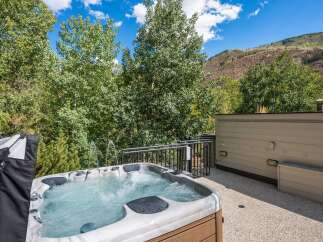 Enjoy ultimate relaxation in this luxurious hot tub, perfect for unwinding after a long day.