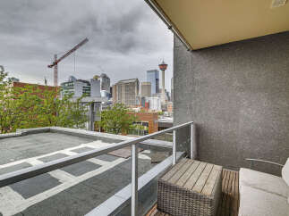 Enjoy breathtaking city views from this private balcony, perfect for morning coffee or evening relaxation.