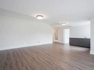 Discover this spacious and modern living area, perfect for entertaining or relaxing.