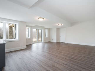 Discover this bright and spacious finished basement, perfect for a recreational room or extra living space.