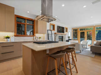 Experience modern living in this stunning open-concept kitchen and living area.