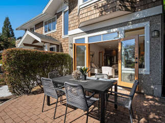 Enjoy seamless indoor-outdoor living with this inviting patio space, perfect for al fresco dining and entertaining.