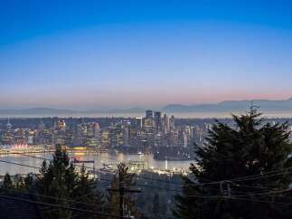 Experience breathtaking panoramic views of the Vancouver skyline from this exceptional property.