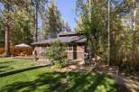 Escape to this charming cabin nestled amongst tall pines and aspens, offering a serene retreat.