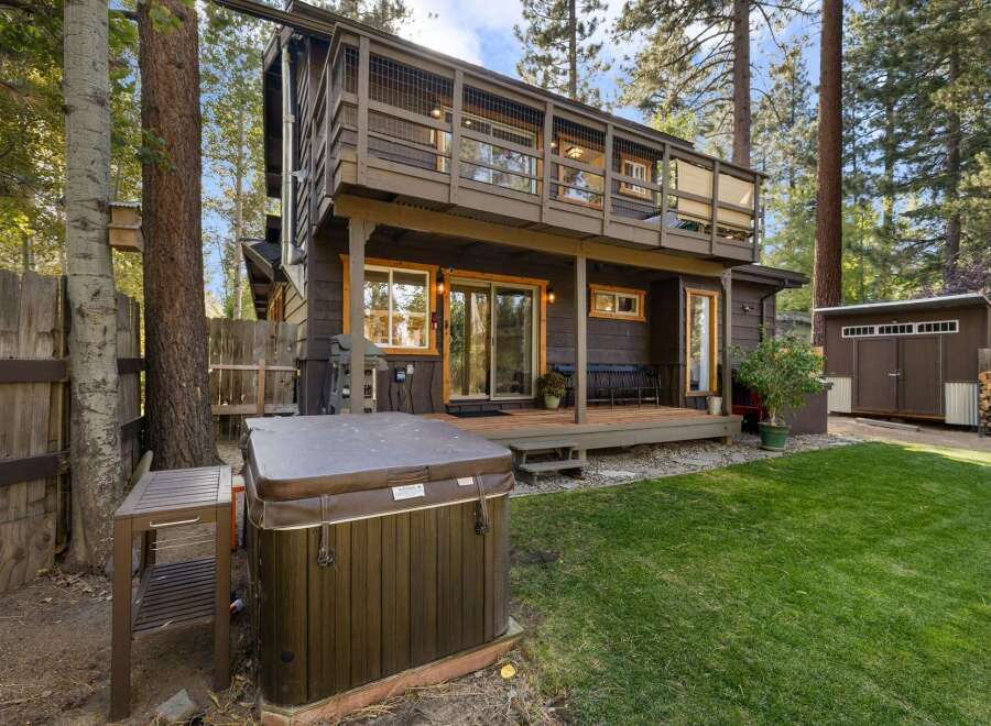 Escape to this charming cabin retreat, complete with a relaxing hot tub perfect for unwinding after a day of adventure.