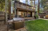 Escape to this charming cabin retreat, complete with a relaxing hot tub perfect for unwinding after a day of adventure.