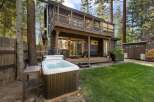 Escape to this charming cabin retreat, complete with a relaxing hot tub perfect for unwinding after a day of adventure.