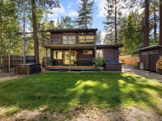 Escape to this charming mountain retreat featuring a multi-level home with a private balcony and a spacious deck perfect for outdoor entertaining.