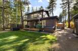Enjoy outdoor living with this charming property featuring a spacious deck and a relaxing hot tub, perfect for unwinding.