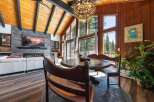 Experience rustic charm and modern comfort in this stunning living and dining area.
