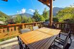 Enjoy breathtaking mountain views from this charming balcony, perfect for al fresco dining or morning coffee.