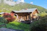 Experience the ultimate mountain retreat in this charming wooden chalet, featuring a private hot tub perfect for relaxing after a day of adventure.
