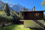 Nestled amidst the majestic Alps, this charming chalet offers breathtaking mountain views and a serene escape.