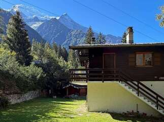Nestled amidst the majestic Alps, this charming chalet offers breathtaking mountain views and a serene escape.