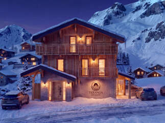 Experience the ultimate alpine retreat in this stunning chalet, nestled amidst snow-capped mountains.