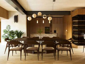 Experience luxury living in this stunning dining room, featuring a sleek, dark wood dining table and chairs perfect for hosting.