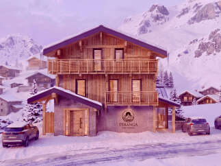 Experience the ultimate alpine retreat in this stunning wooden chalet, nestled amidst snow-capped mountains.