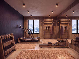 Experience ultimate wellness in this stunning home gym, featuring a state-of-the-art curved treadmill and a classic rowing machine, both crafted from beautiful wood.
