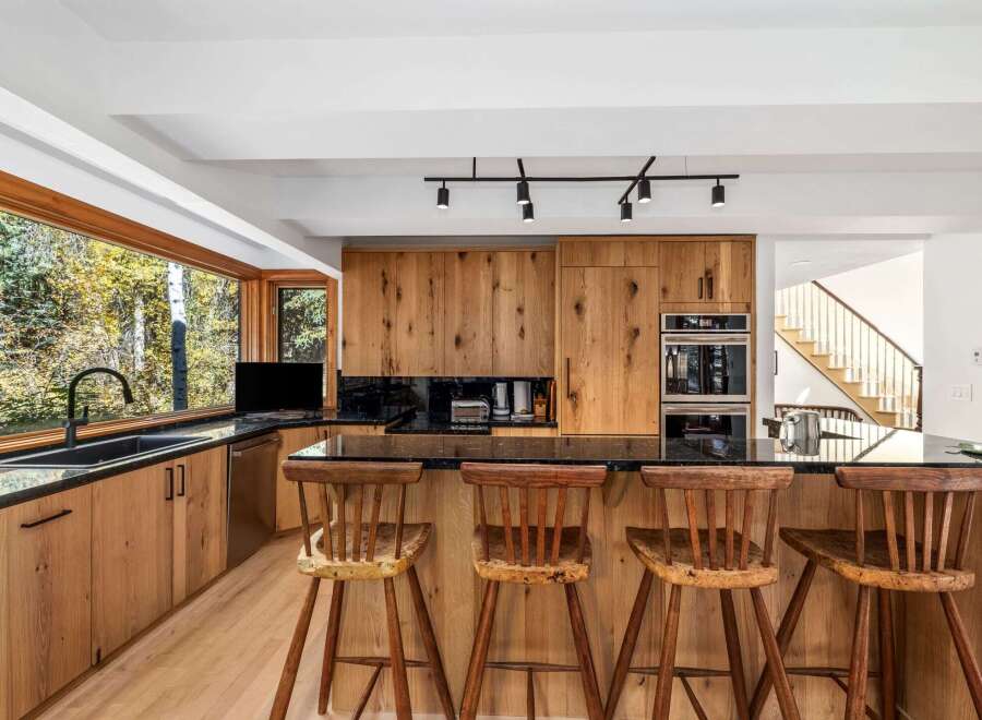Experience the perfect blend of modern luxury and natural beauty in this stunning kitchen.