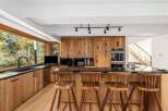 Experience the perfect blend of modern luxury and natural beauty in this stunning kitchen.
