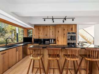 Experience the perfect blend of modern luxury and natural beauty in this stunning kitchen.