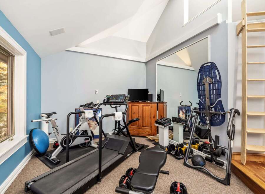 Transform your home into a personal fitness sanctuary with this well-equipped gym.