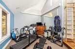 Transform your home into a personal fitness sanctuary with this well-equipped gym.