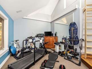 Transform your home into a personal fitness sanctuary with this well-equipped gym.