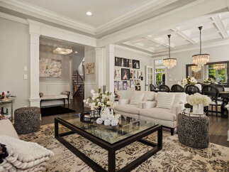 This elegant living and dining area features a spacious open floor plan, perfect for entertaining.