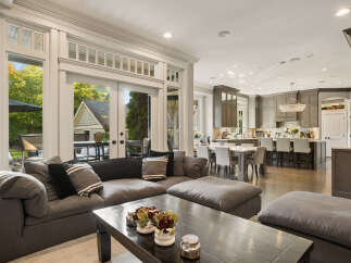 Experience seamless indoor-outdoor living in this stunning open-concept home, featuring a spacious living area that flows directly into a gourmet kitchen and dining space.