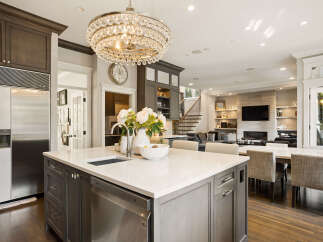 Experience luxury living in this stunning open-concept kitchen and living area, perfect for entertaining.