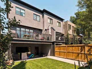 Discover this modern townhouse with a private backyard oasis, perfect for relaxation and entertainment.