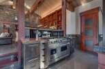 Experience luxury mountain living in this stunning kitchen, featuring a professional-grade Viking range and custom wood cabinetry.