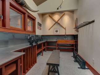 This unique space offers a dedicated workshop area, perfect for tuning skis or pursuing other hobbies.