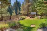 Enjoy ultimate relaxation in this backyard oasis, featuring a luxurious hot tub perfect for unwinding after a long day.