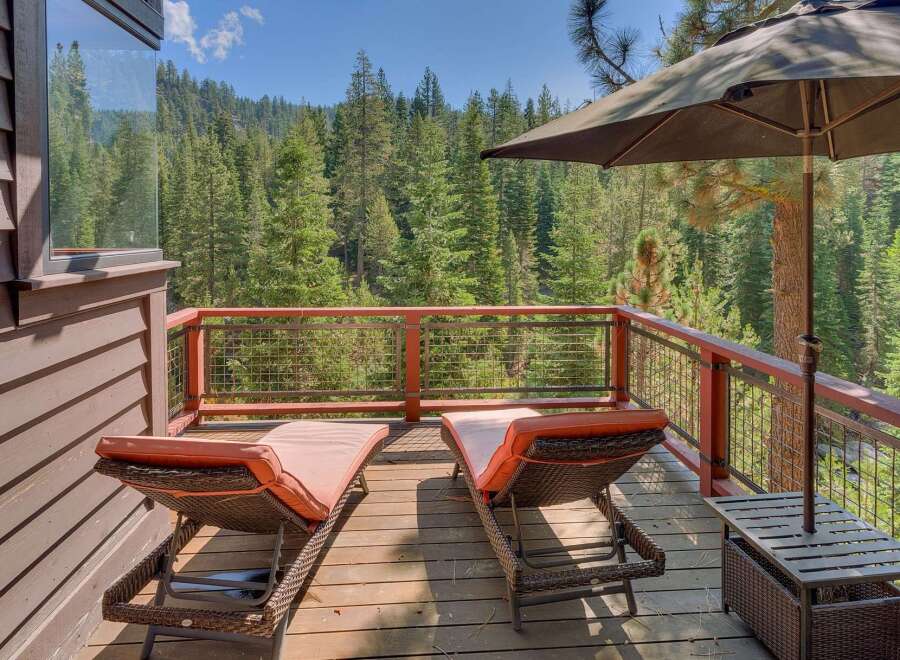 Enjoy breathtaking mountain views from this spacious deck, perfect for relaxation and entertaining.