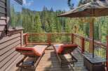 Enjoy breathtaking mountain views from this spacious deck, perfect for relaxation and entertaining.