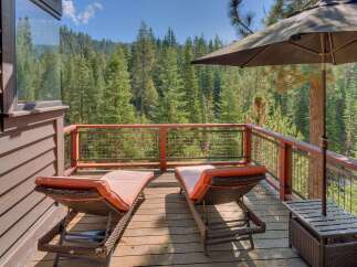 Enjoy breathtaking mountain views from this spacious deck, perfect for relaxation and entertaining.