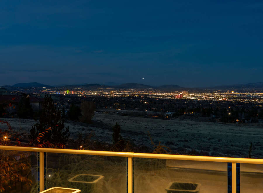 Experience breathtaking panoramic views of the city lights from this elevated property, perfect for entertaining or quiet evenings.