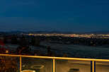 Experience breathtaking panoramic views of the city lights from this elevated property, perfect for entertaining or quiet evenings.