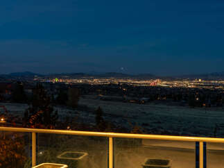 Experience breathtaking panoramic views of the city lights from this elevated property, perfect for entertaining or quiet evenings.