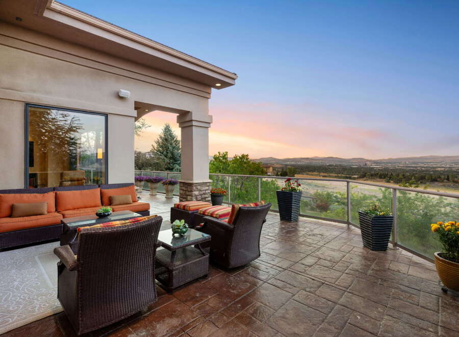 Enjoy breathtaking sunset views from this expansive patio, perfect for entertaining or quiet relaxation.