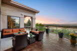 Enjoy breathtaking sunset views from this expansive patio, perfect for entertaining or quiet relaxation.