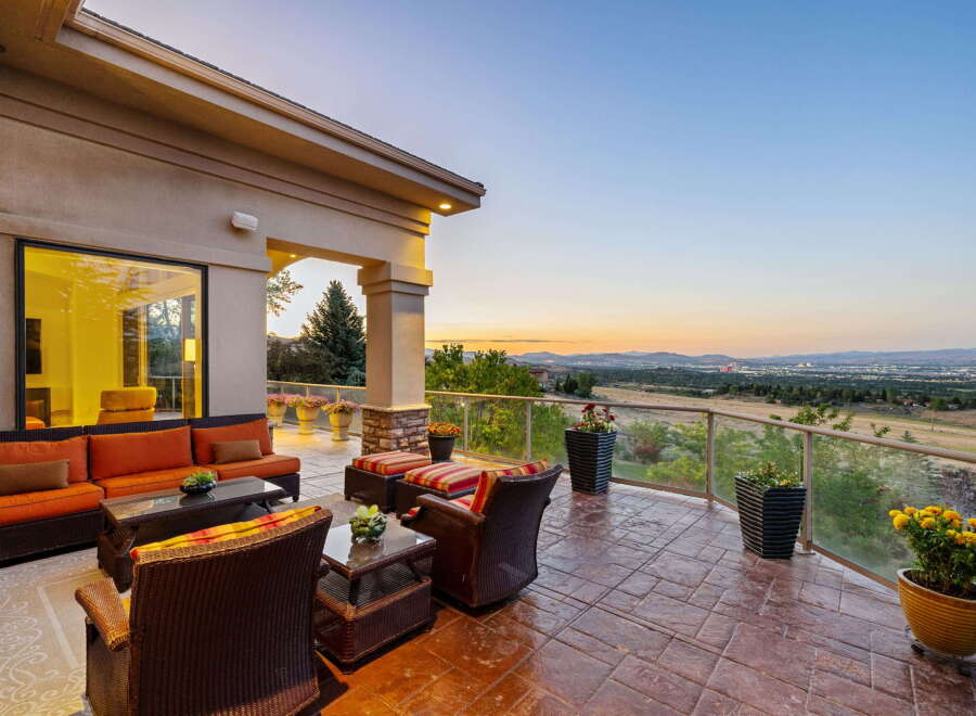 Experience breathtaking sunset views from this expansive patio, perfect for entertaining or quiet relaxation.