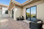 Enjoy breathtaking panoramic views from this expansive patio, perfect for entertaining or quiet relaxation.