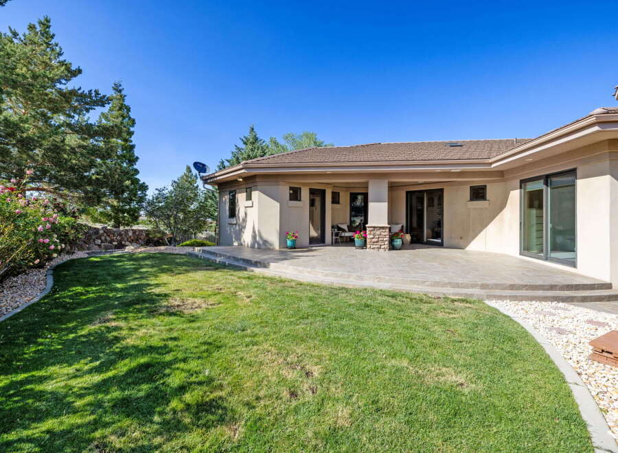 Enjoy outdoor living with this spacious patio, perfect for entertaining guests or relaxing in the sun.
