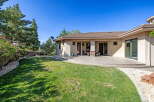 Enjoy outdoor living with this spacious patio, perfect for entertaining guests or relaxing in the sun.