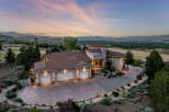 Experience luxury living with this stunning estate, boasting a modern architectural design and breathtaking panoramic views of the city and surrounding mountains.